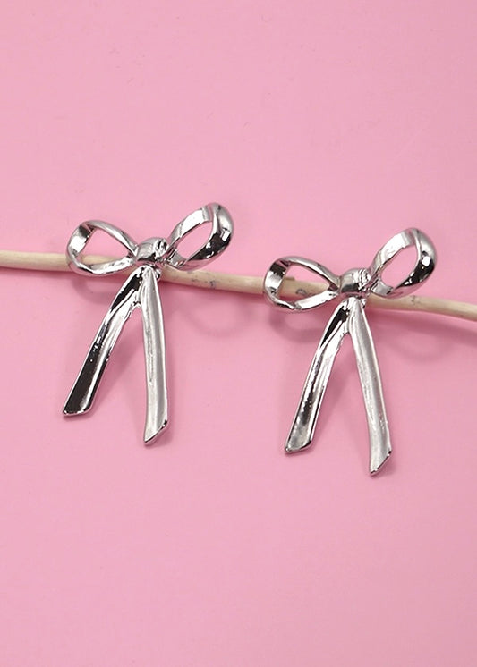 Dangling Silver Bow Earrings