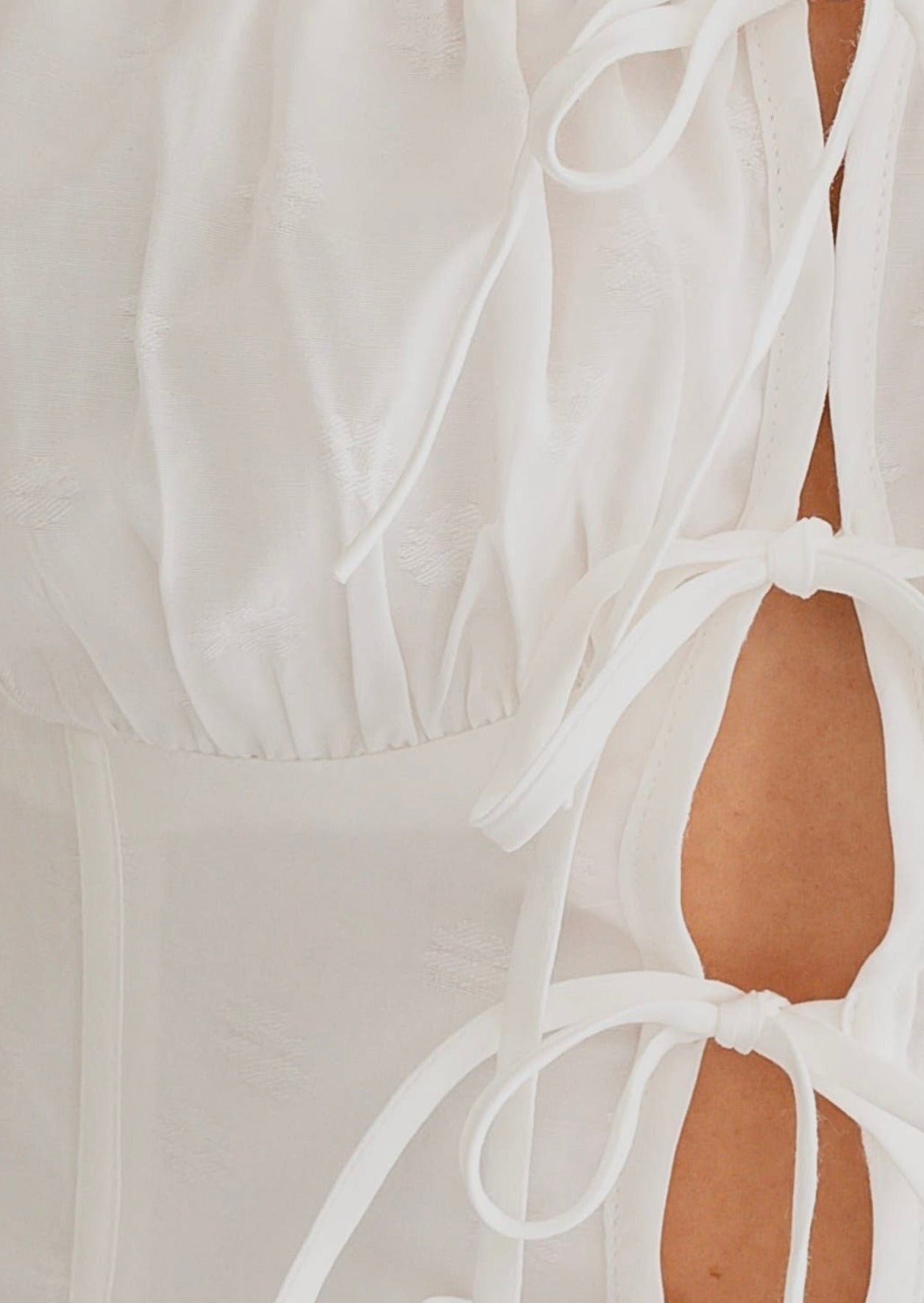 Can't Be Tamed Asymmetrical  TIE DETAIL OPEN CROP TOP